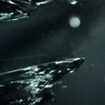 A frame of a glass breaking in both #3 STIGMA (V) and #5 REFLECTION (RM)
