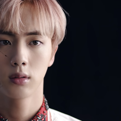 Jin's cracked reflection in Blood, Sweat & Tears