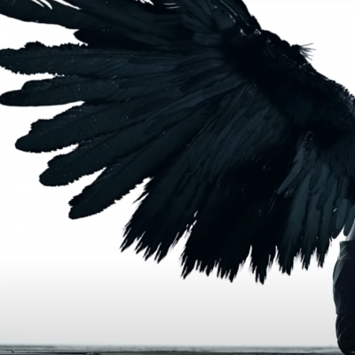 Wings sprouting from V's back (The WINGS Tour Trailer)