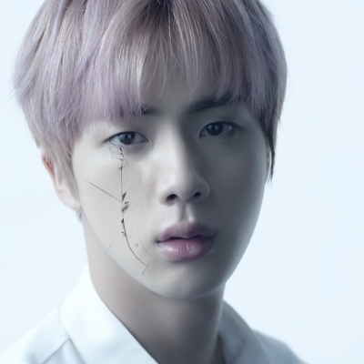 Jin's face cracking in The WINGS Tour Concert Trailer